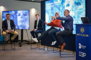 The members of the ethics panel speaking to an audience at D3IP's Autonomy Unleashed expo.